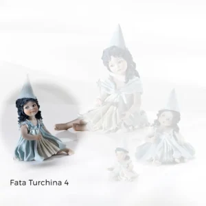 Statua in porcellana della Fata Turchina con capelli sciolti e bacchetta magica argentata.